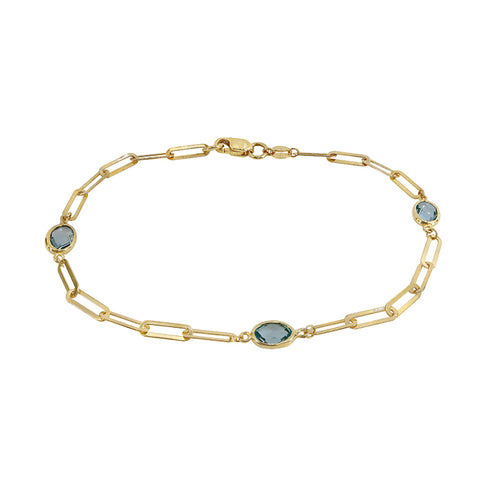 10K Gold 3mm flat paperclip bracelet with 5x7mm blue topaz 7.5 