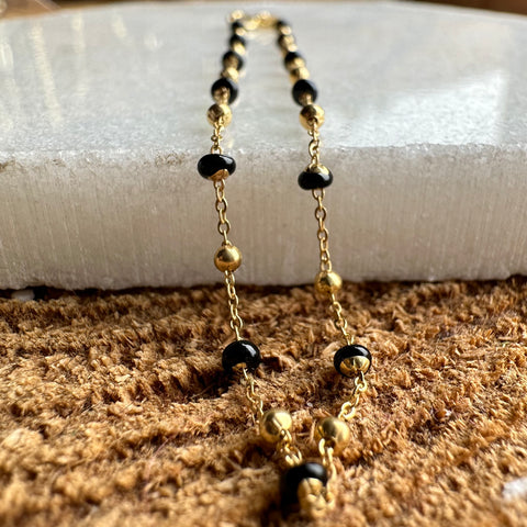 11 Bracelet Solid Gold 10K rolo chain with gold beads black enamel